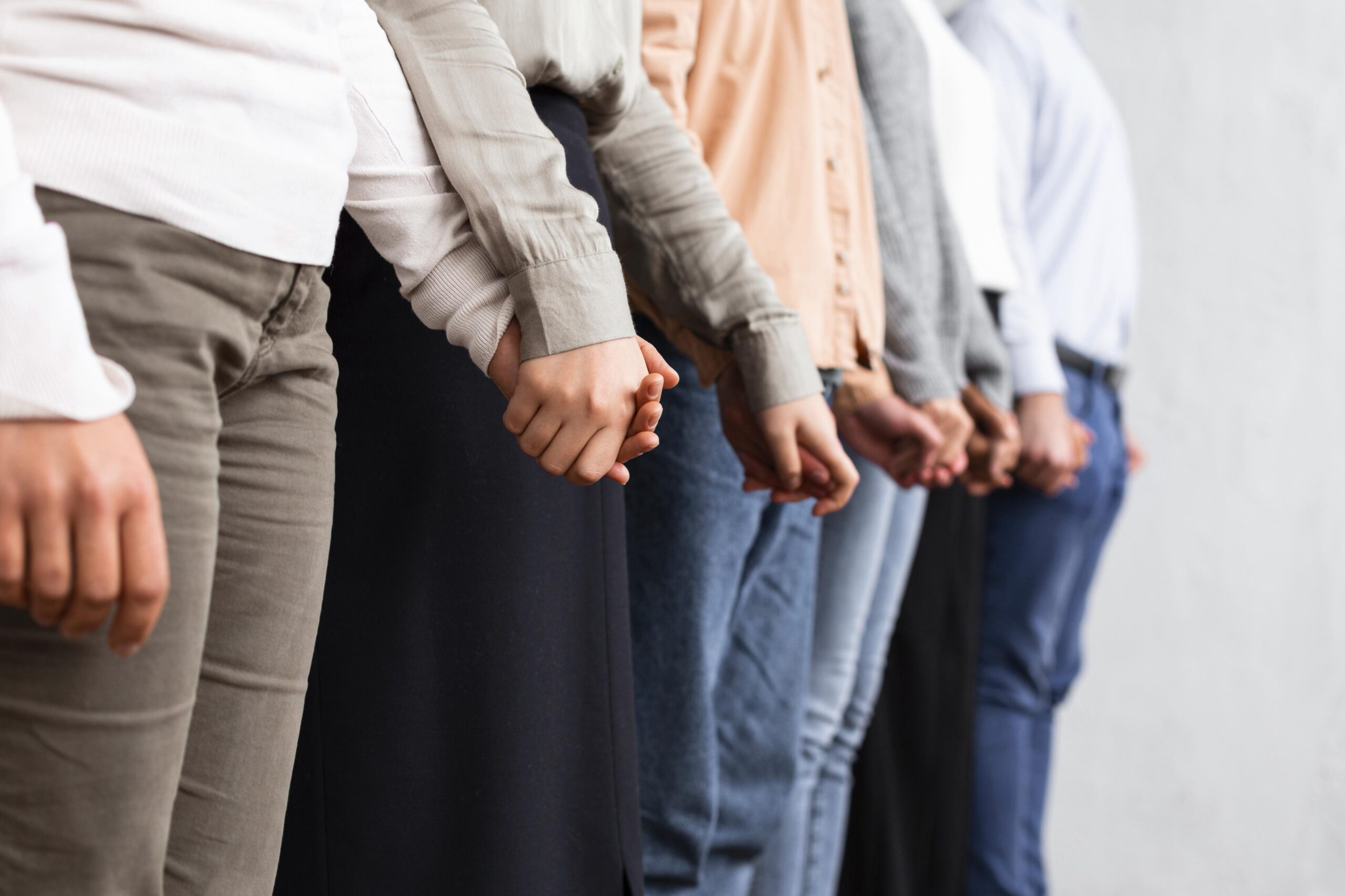 people-holding-hands-group-therapy-session
